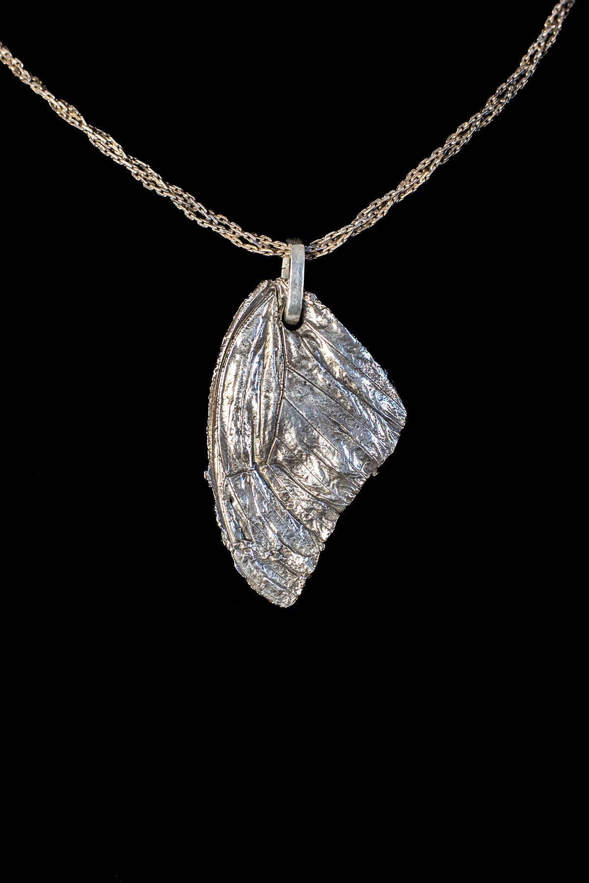Small Butterfly Wing Fossil Pendant — image 1